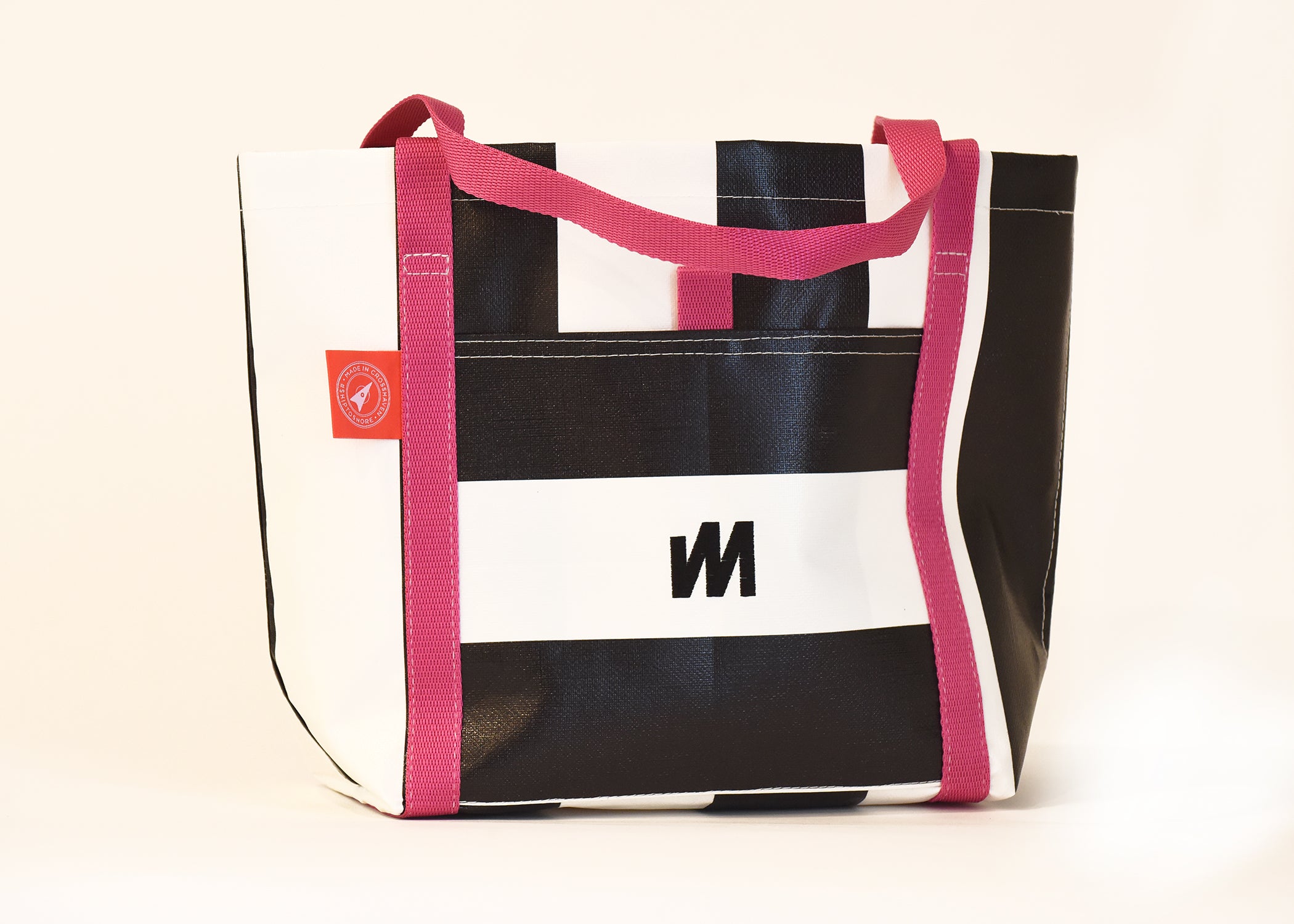 Pink and black outlet tote bag